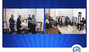 دیدار مدیرعامل بانک تجارت با خانواده شهید علی تیزکار